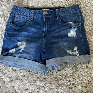 these are blue dollhouse jean shorts with rips!